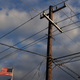 The U.S. flag flies next to a power pole on Feb. 21, 2021 in Houston, Texas.